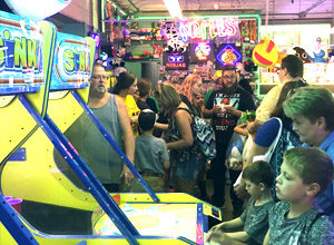 Playing at Playland Arcade